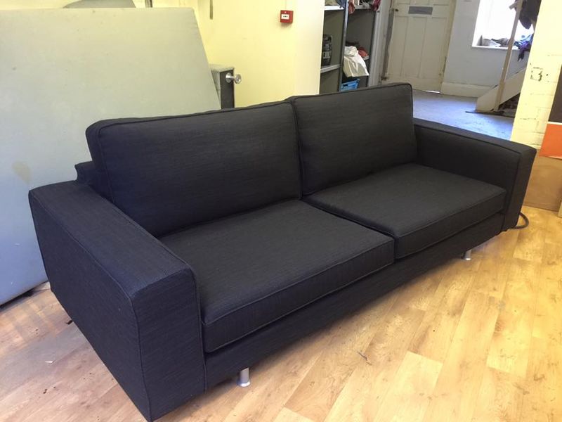 B&B Italia sofa with a custom loose cover in dark navy fabric