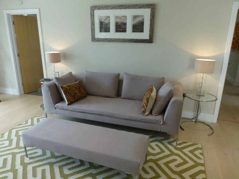 B&B Italia sofa and ottoman covers in a living room, seen from the side