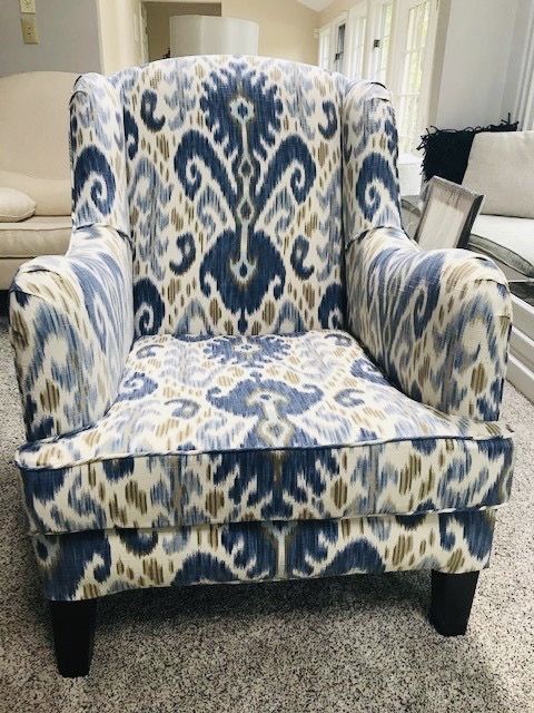 Club chair in a blue ikat tailored loose cover