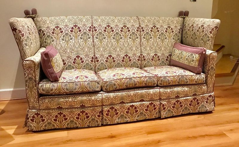 Country house sofa with a tailored loose cover in a traditional floral print