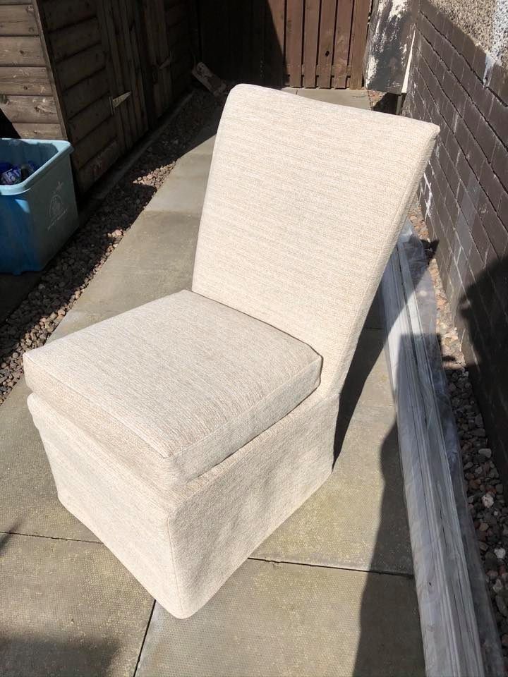 Finished cream slipper chair cover outdoors