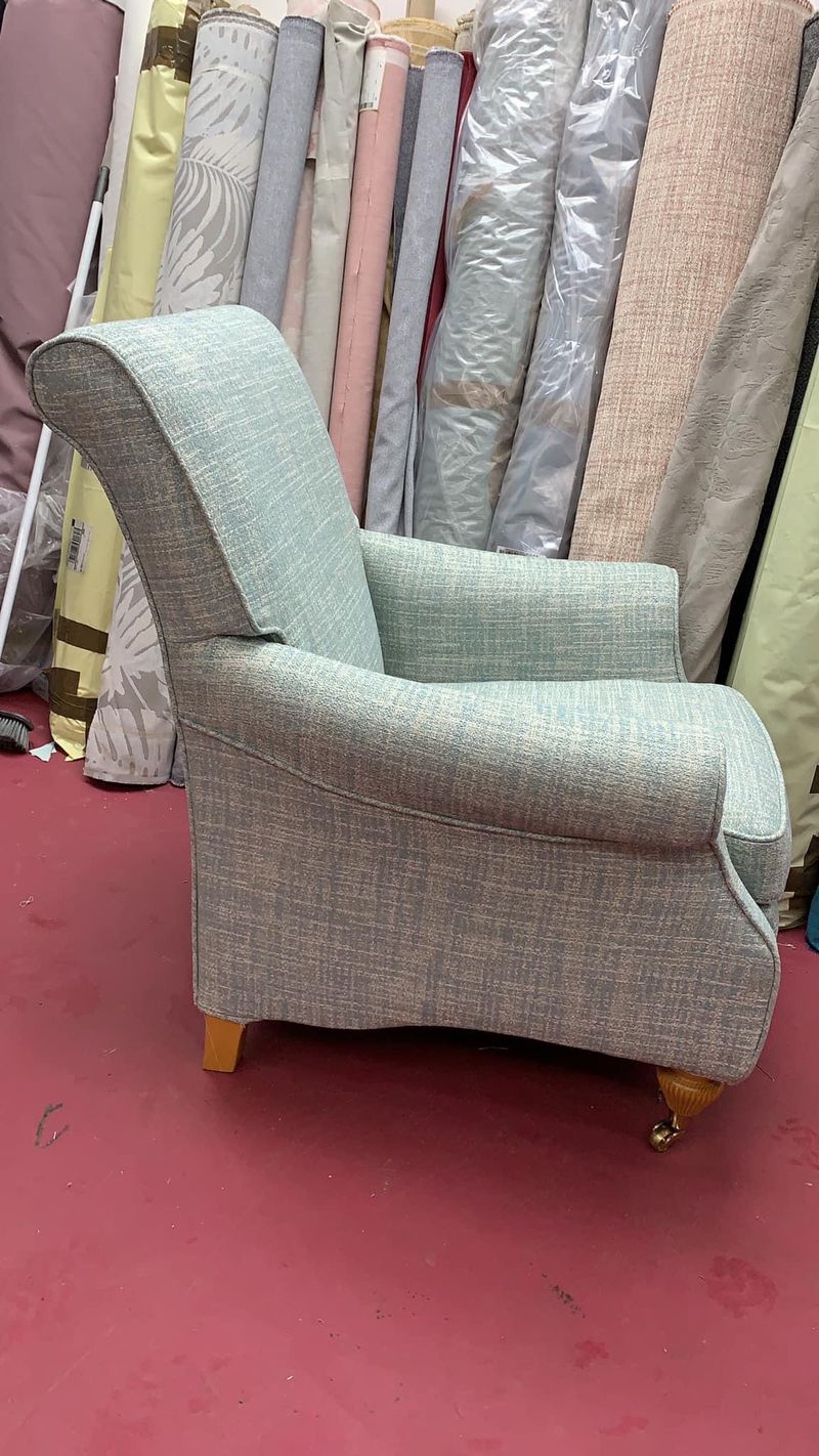 Armchair in a duck-egg replacement loose cover