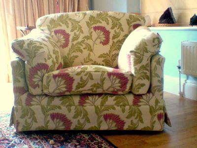 Ercol armchair loose cover in green and pink floral fabric