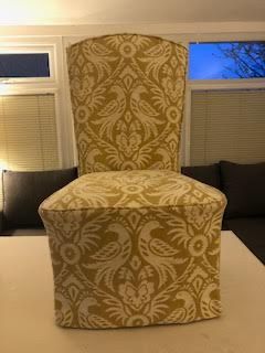 Front view of Sonia's gold damask chair cover